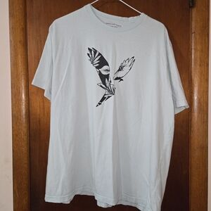 American Eagle Outfitters Pale Blue Tee with Black Bird Graphic